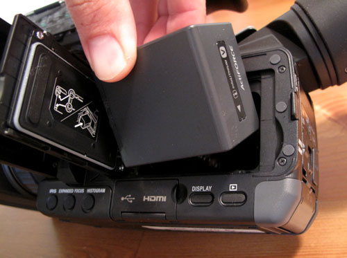Inserting battery into Sony NX70